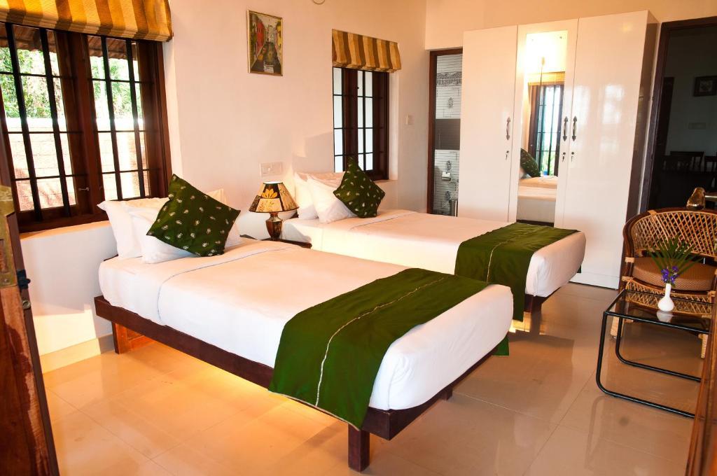 Saro Lake County Kumarakom Zimmer foto